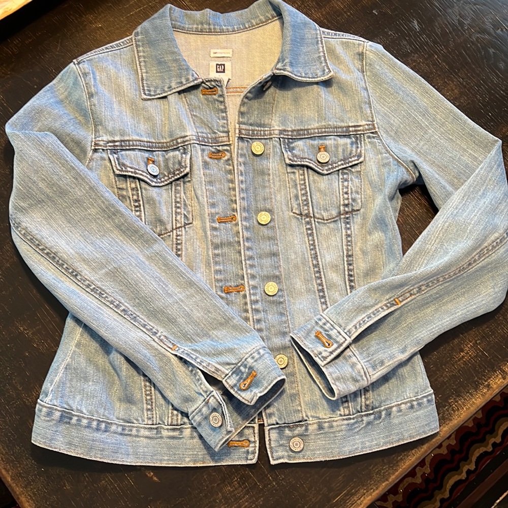 Gap size small light colored blue jean jacket.